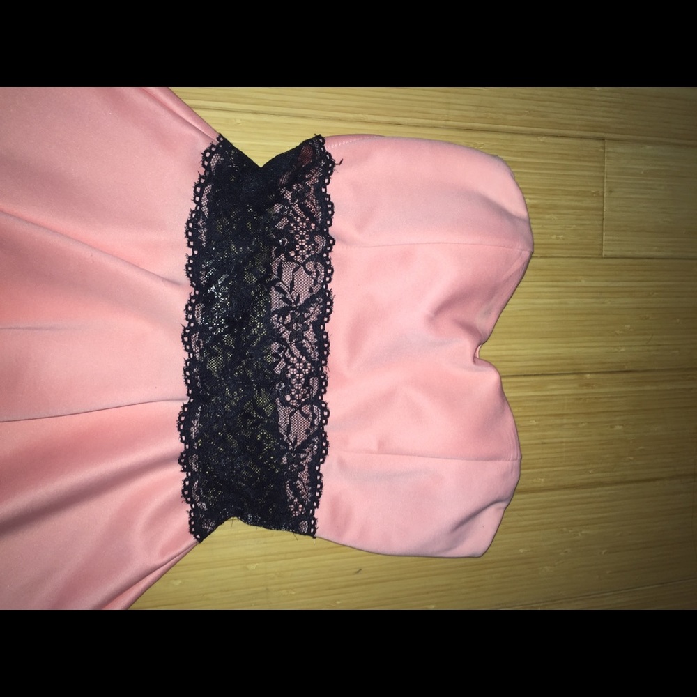 Pink strapless dress with black lace belt